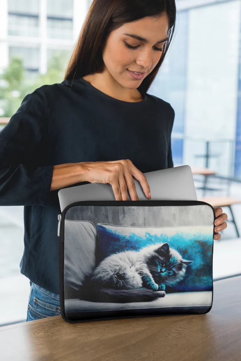 Blue-Eyed Sleeping Cat on Grey Couch Laptop Sleeve 1