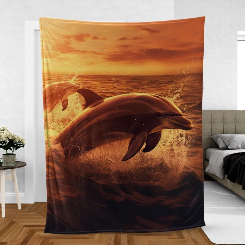 Dolphins Jumping at Sunrise Fleece Blanket