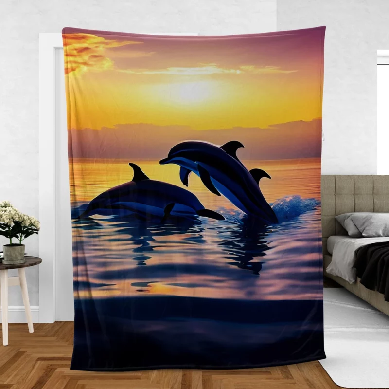 Dolphins Swimming at Sunrise Fleece Blanket