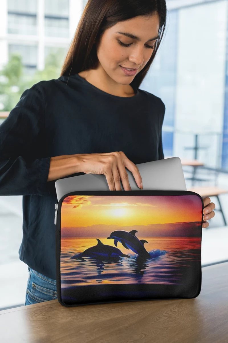 Dolphins Swimming at Sunrise Laptop Sleeve 1