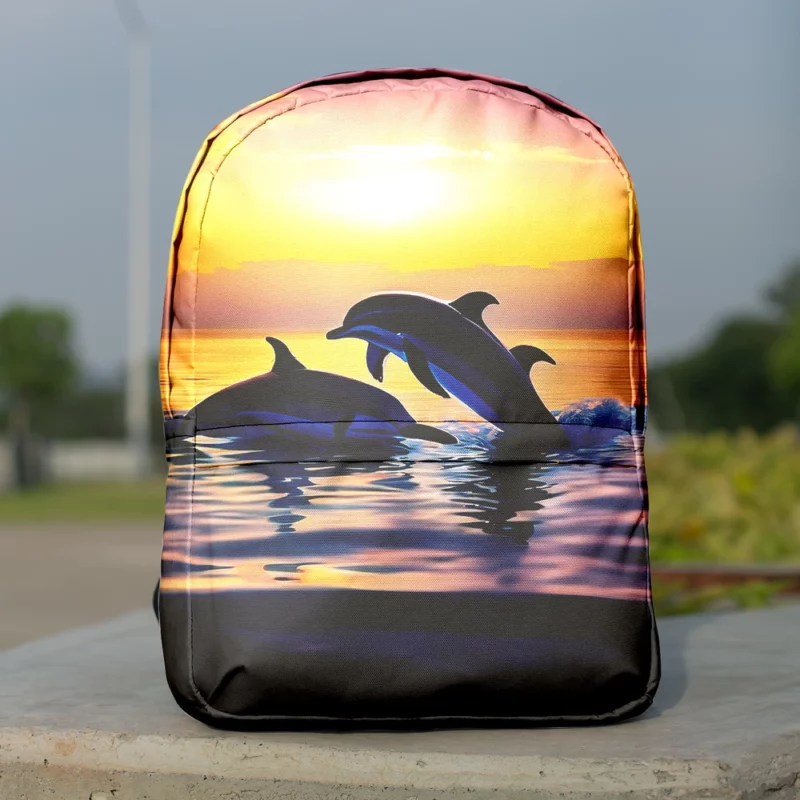 Dolphins Swimming at Sunrise Minimalist Backpack