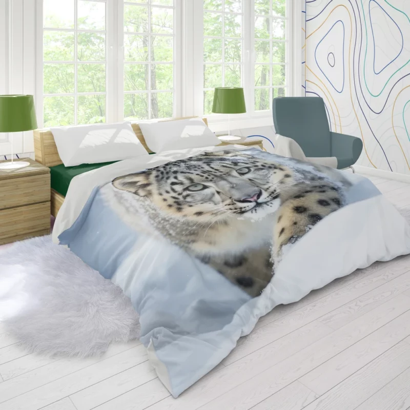 Snow Leopard Prowling in the Snowstorm Duvet Cover