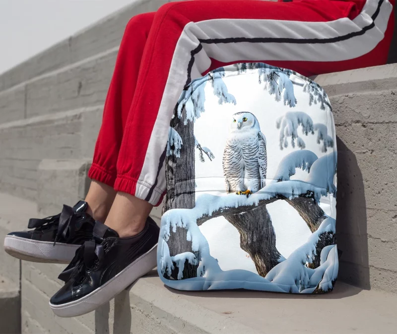 Stealthy Snowy Owl on Branch Minimalist Backpack 1