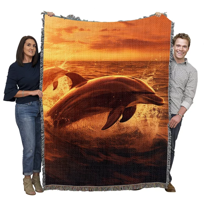 Dolphins Jumping at Sunrise Woven Blanket