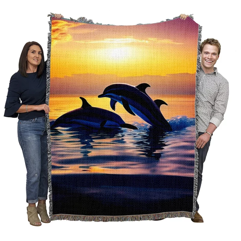 Dolphins Swimming at Sunrise Woven Blanket