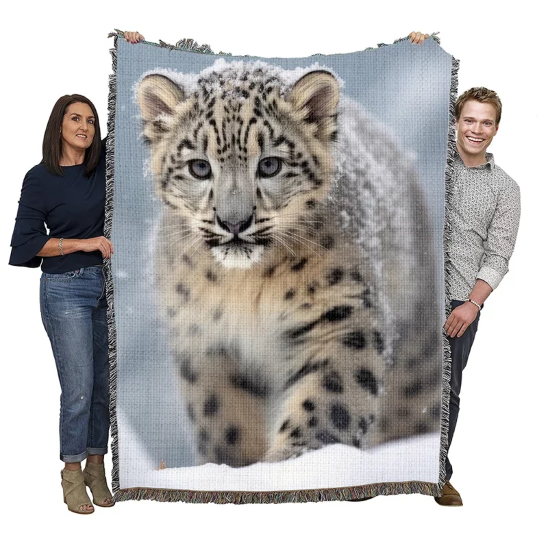 Snow Leopards Stroll Through Snowy Realm Woven Blanket